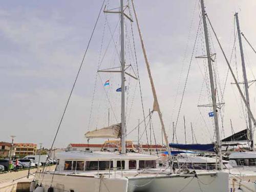 Catamaran Lagoon 400 available for charter in Marina Polesana