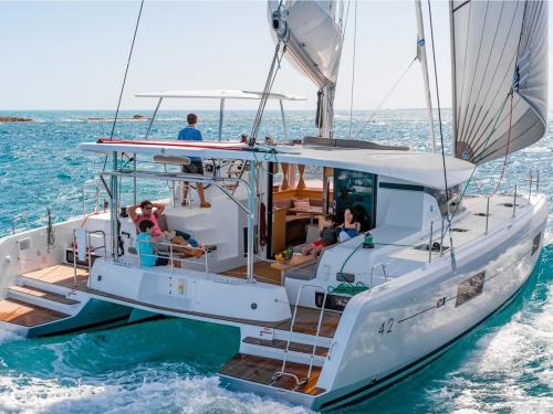 Catamaran Lagoon 42 available for charter in Portisco