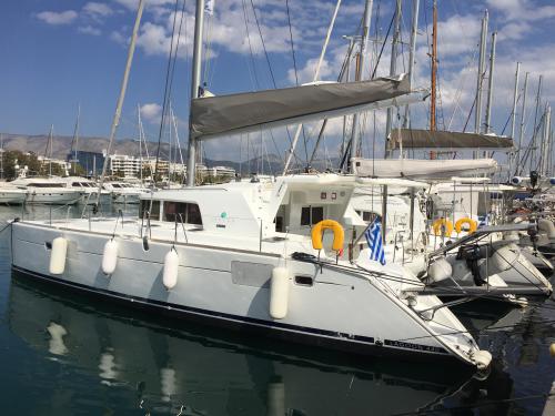 Catamaran Lagoon 440 available for charter in Alimos Marina Kalamaki