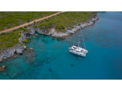 Catamaran Lagoon 46 available for charter in Skiathos main Harbour