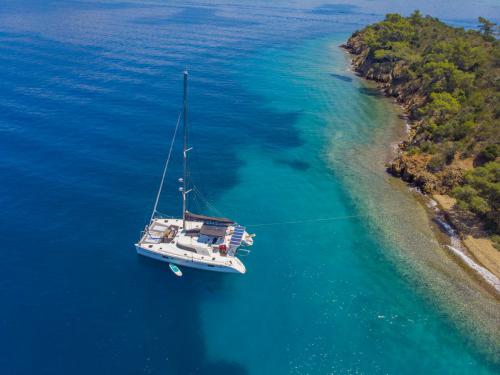 Catamaran Lagoon 500 for hire in Ece Saray Marina