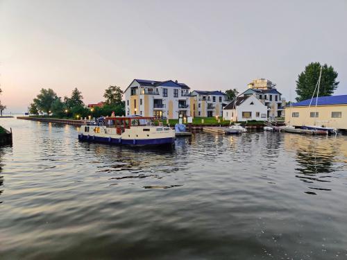 Hausboot Kormoran 1500 chartern in Rechlin