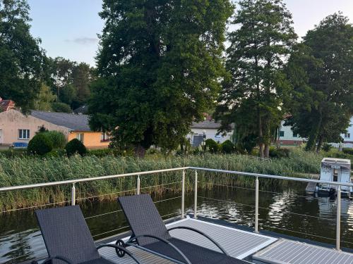 Houseboat Woma D13 for charter in Marina Roeblinsee Houseboat Woma D13 for charter in Marina Roeblinsee