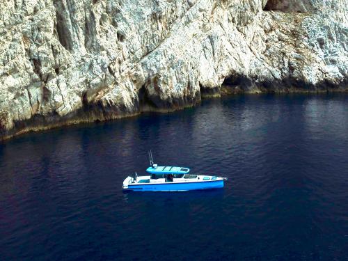 Motor yacht Axopar 37 available for charter in Port Lavrio