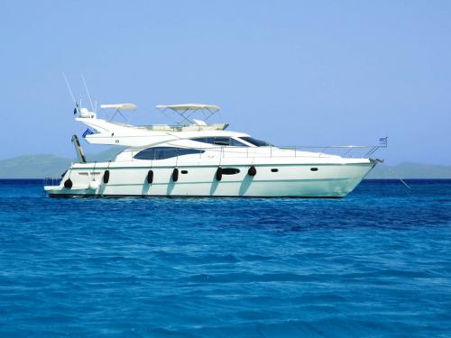 Motorboat Ferretti 58 for charter in Tourlos Marina