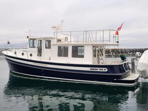 Motorboot Nordic Tug 37 Yachtcharter in Port Sidney Marina