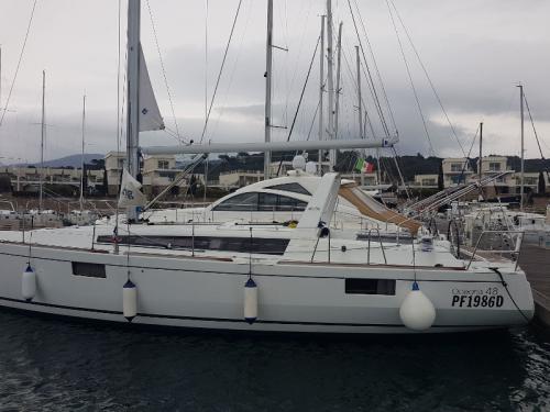 Sailing boat Oceanis 48 available for charter in Puntone