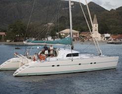 Catamaran Lagoon 570 for hire in Tamarind Yacht Club