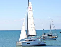 Catamaran Lucia 40 for hire in Abel Point Marina